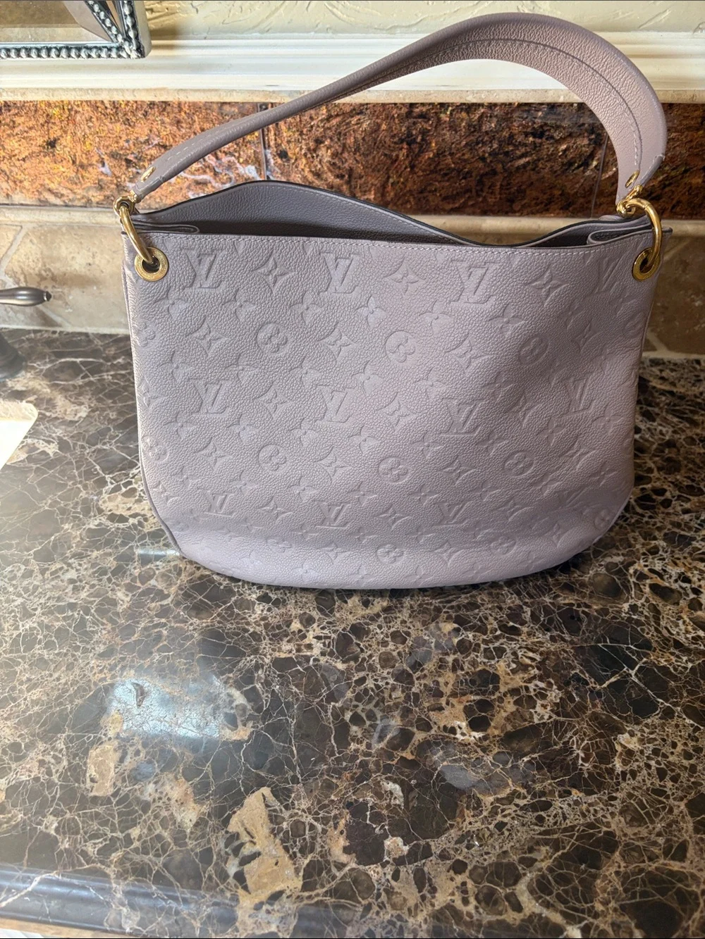 Louis Vuitton Taupe Empreinte Spontini Shoulder Bag with Gold Hardware.